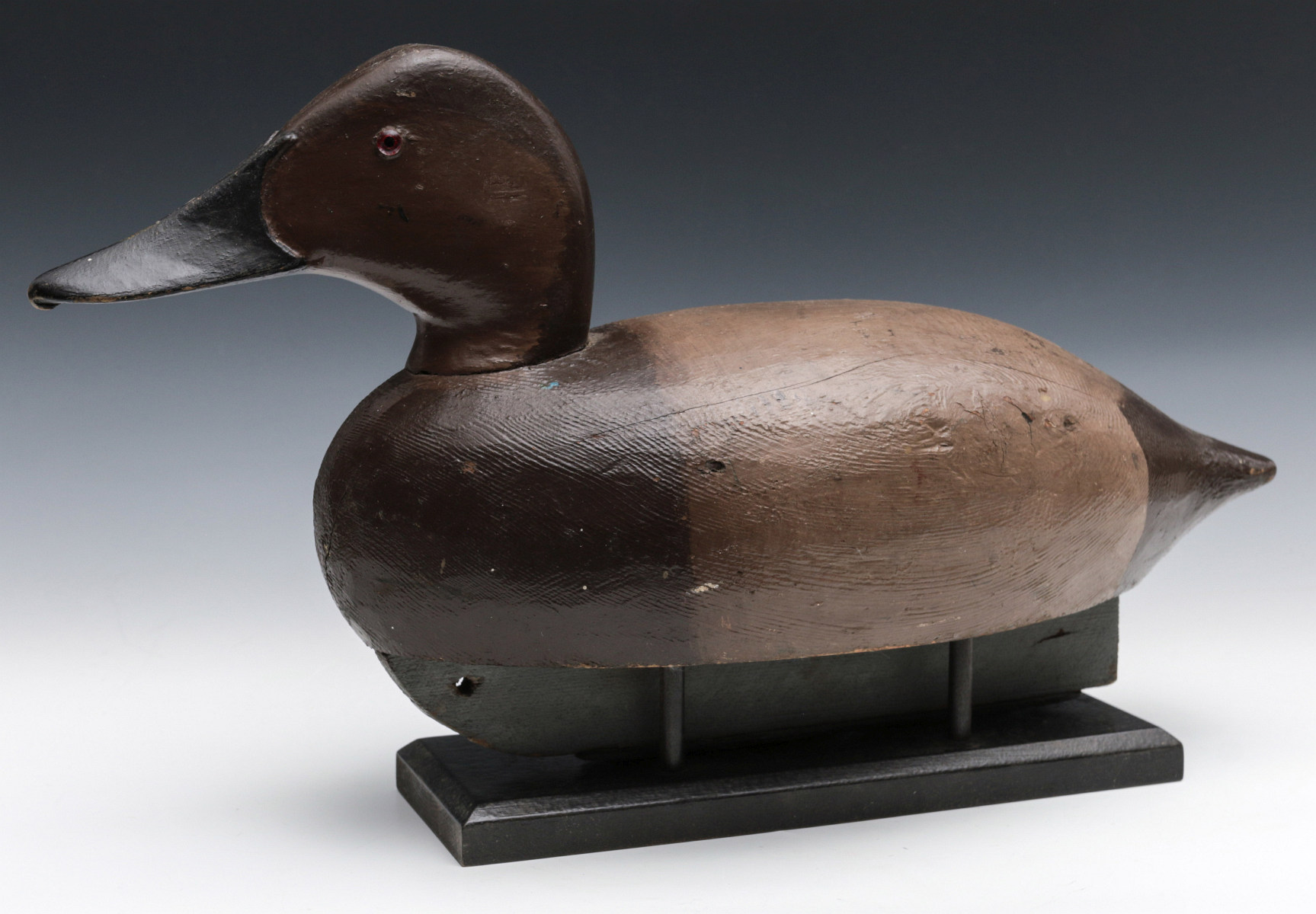 A CANVASBACK DRAKE DECOY, NEW BALTIMORE, MICHIGAN