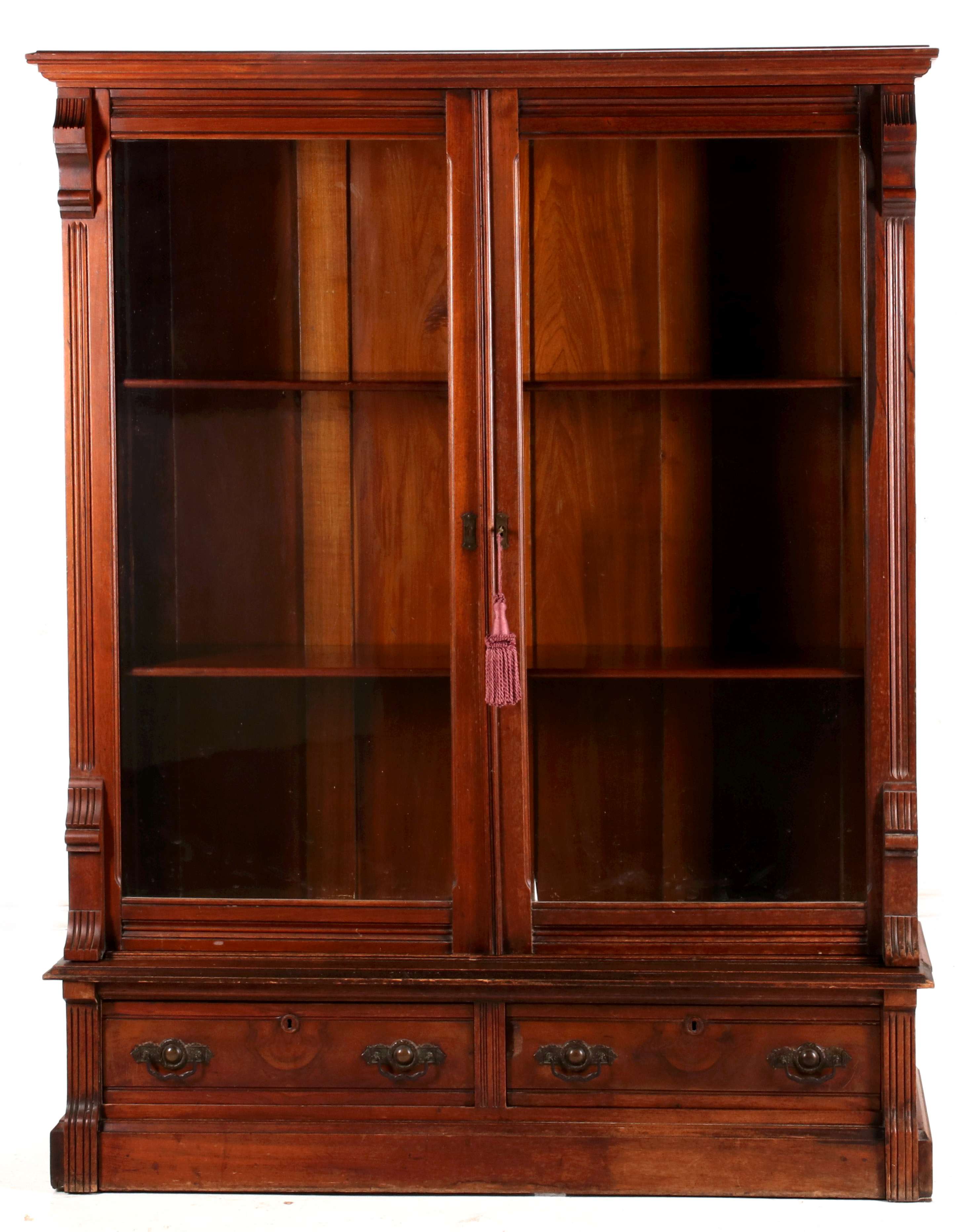 A CLASSIC 19TH CENTURY AMERICAN WALNUT BOOKCASE