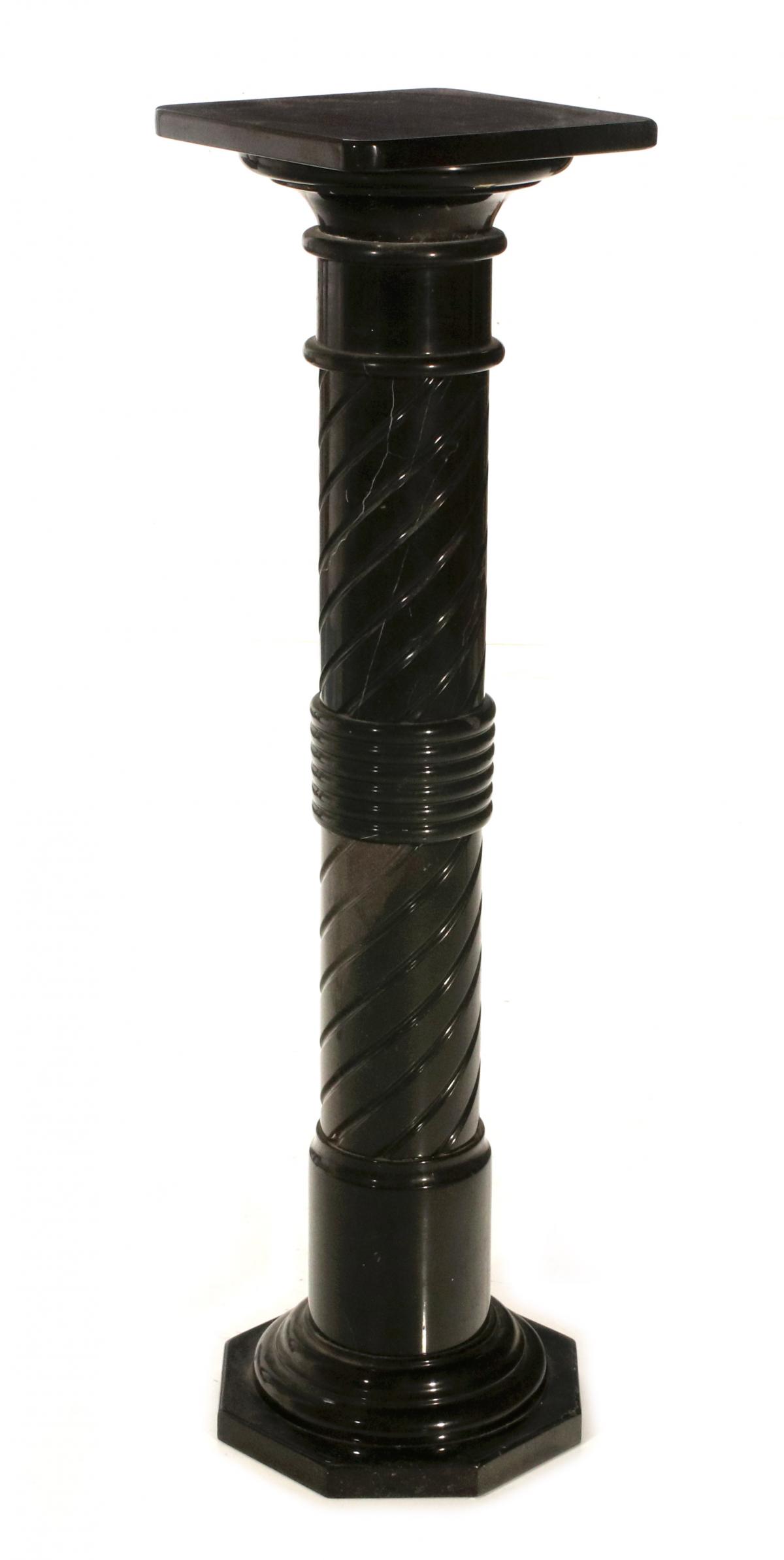 A 20TH CENTURY BLACK MARBLE PEDESTAL