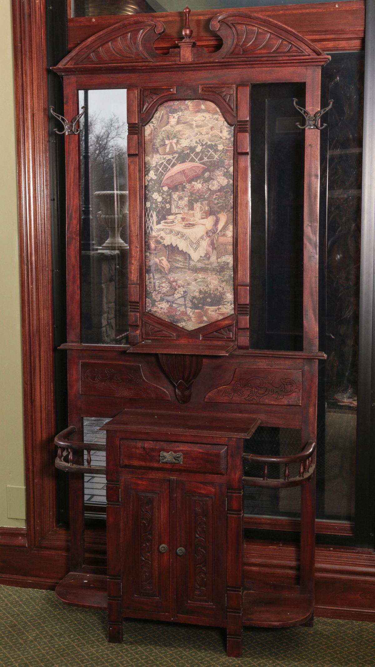 A LATE 20TH CENTURY CARVED MAHOGANY HALL TREE