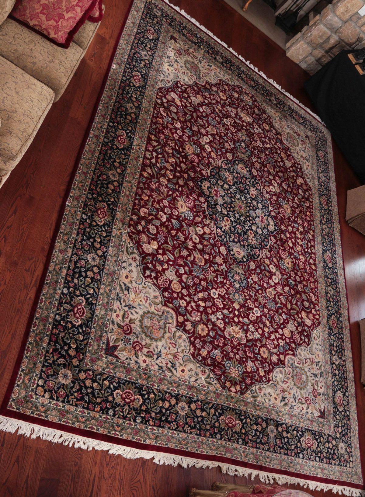 A PERSIAN TABRIZ HAND MADE CARPET