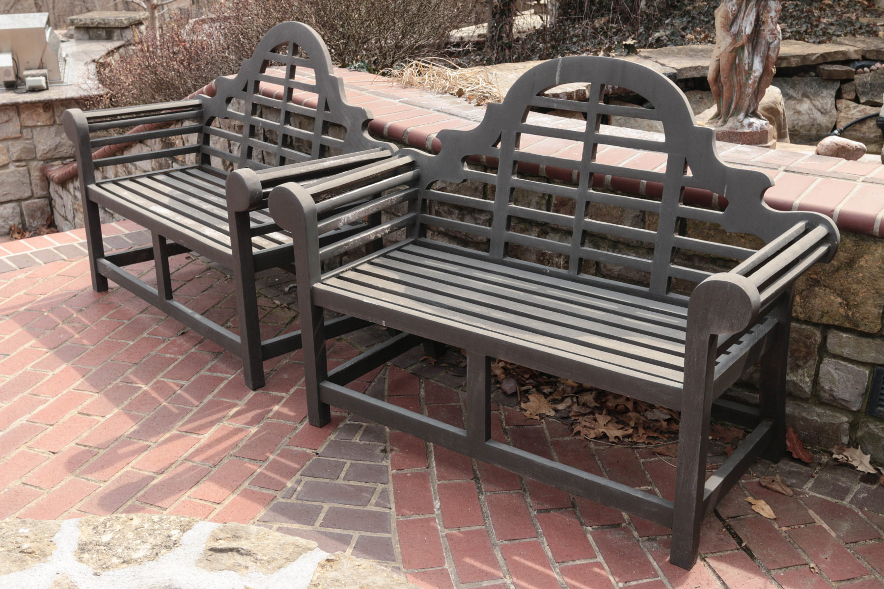 A PAIR OF TEAK GARDEN BENCHES