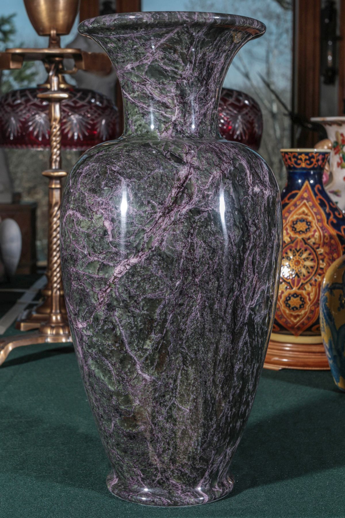 A SERPENTINE JADE POLISHED MULTI- COLOR STONE VASE