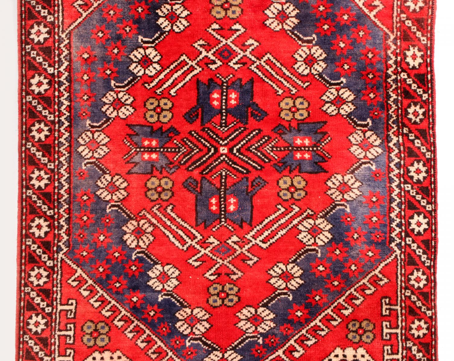 AN ANTIQUE TURKISH BERGAMA RUNNER RUG