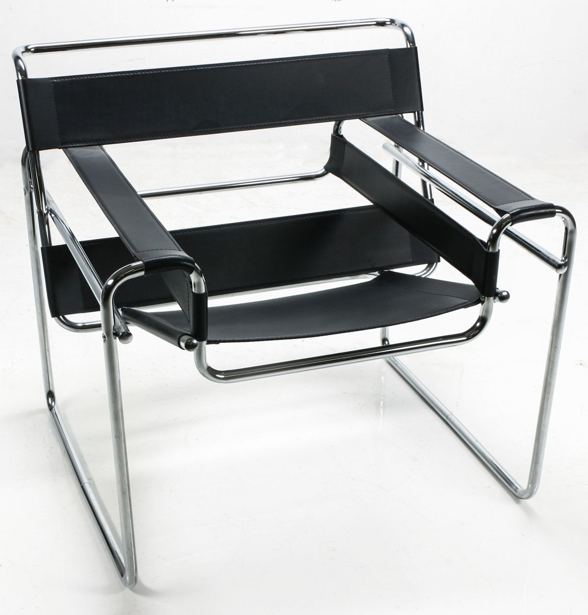 A WASSILY TYPE ARM CHAIR OF MODERN DESIGN