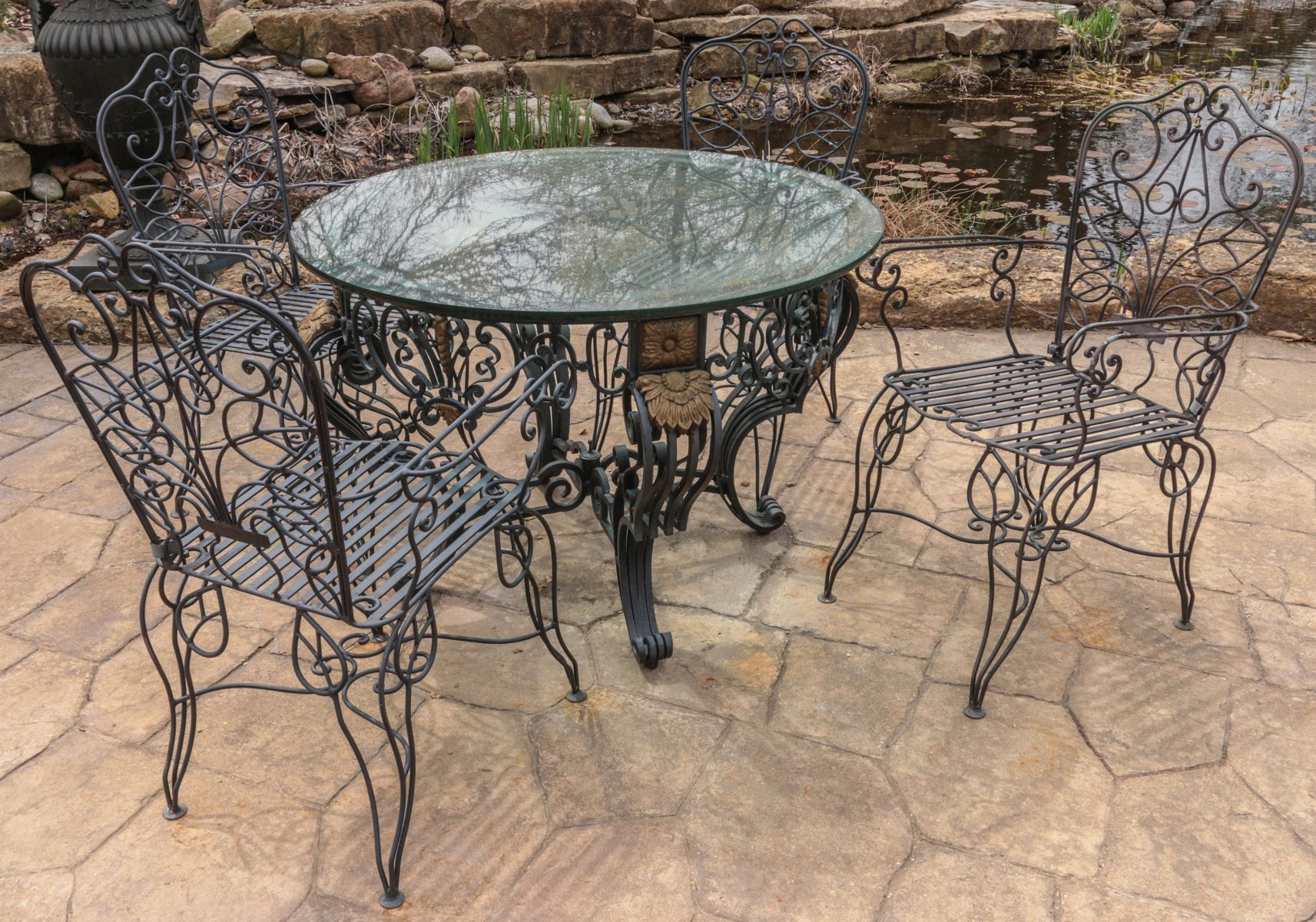 A NICE WROUGHT IRON OUTDOOR PATIO DINING SET