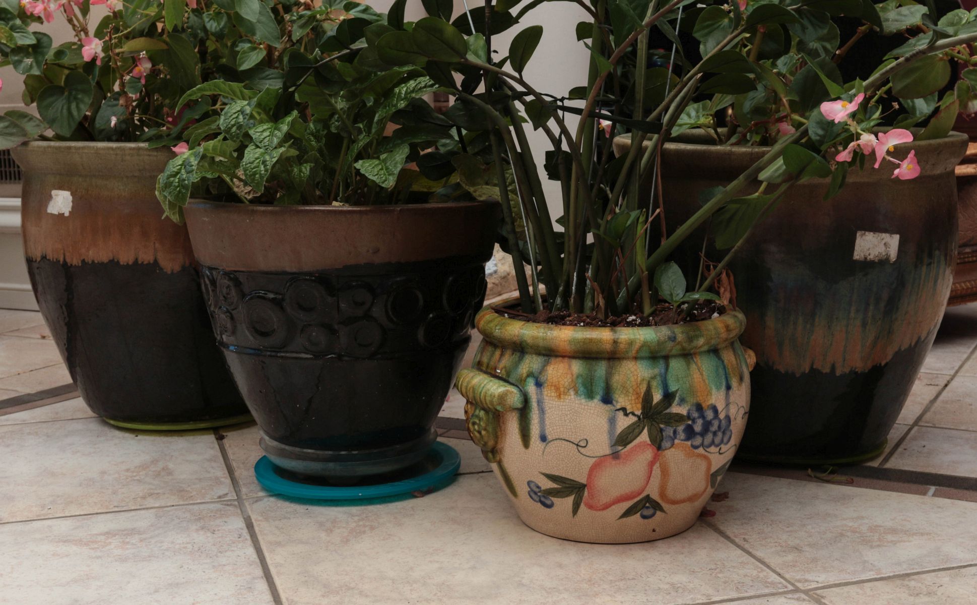 FOUR POTTERY JARDINIERES