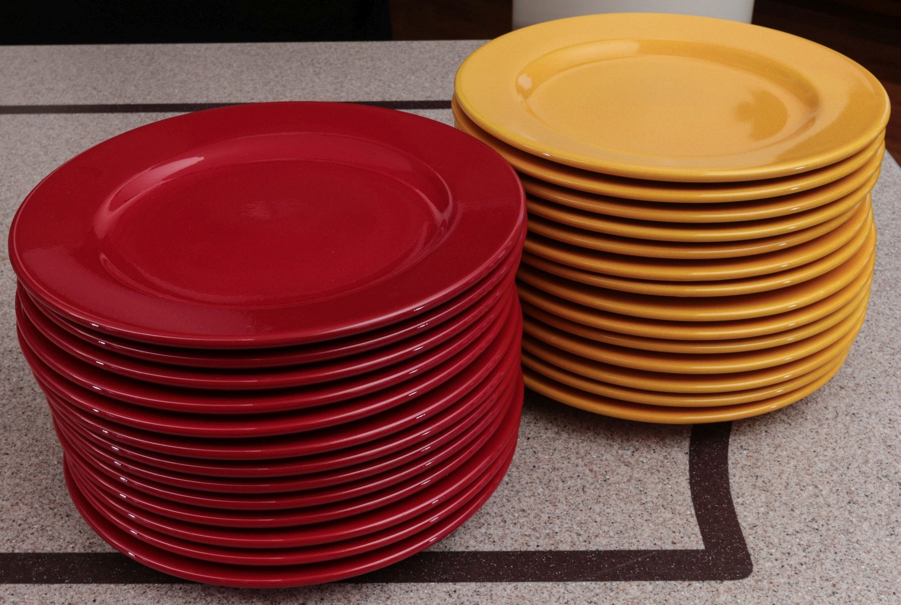 A SET OF WAECHTERSBACH 'FUN FACTORY' DINNER PLATES