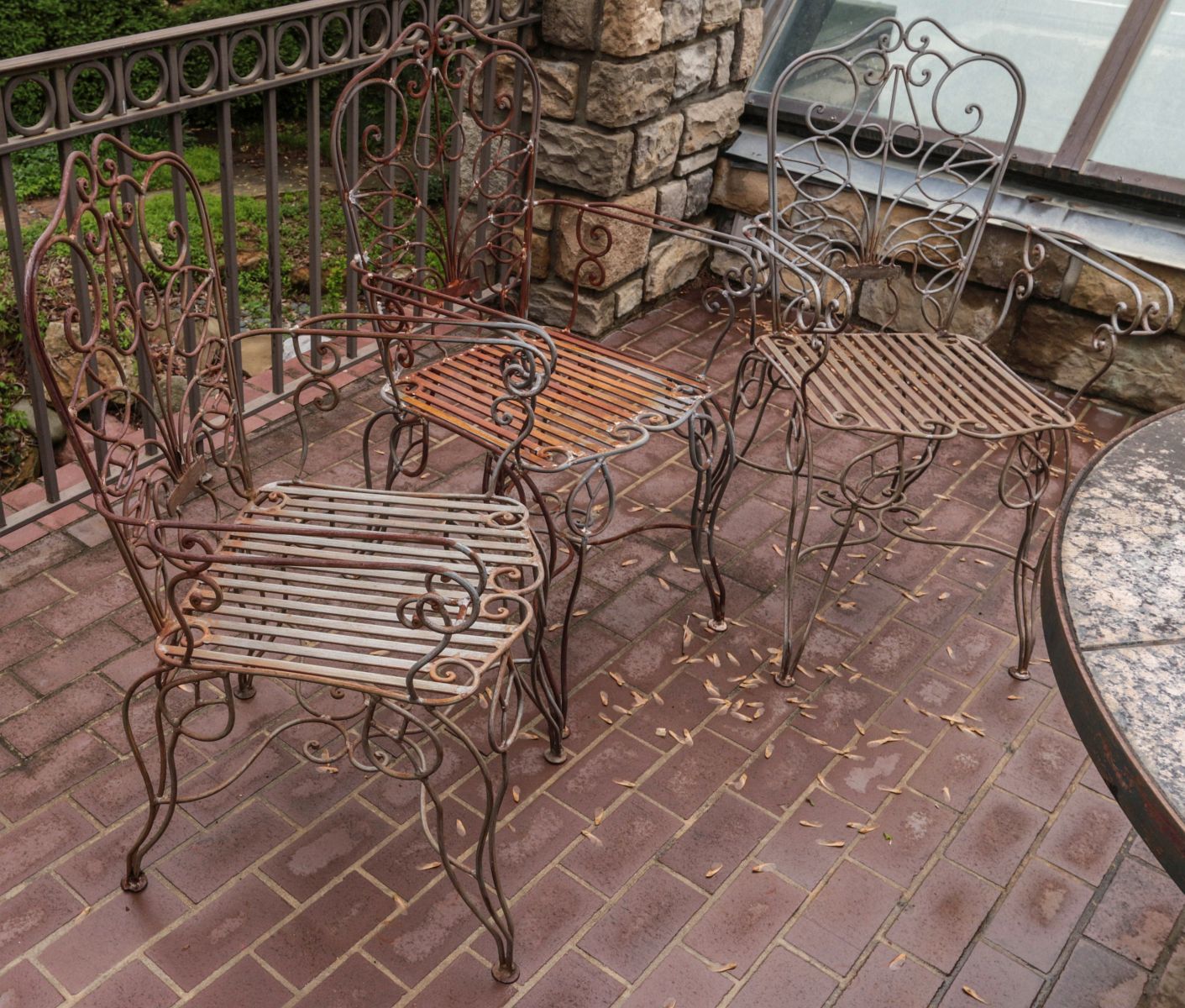 THREE IRON PATIO CHAIRS