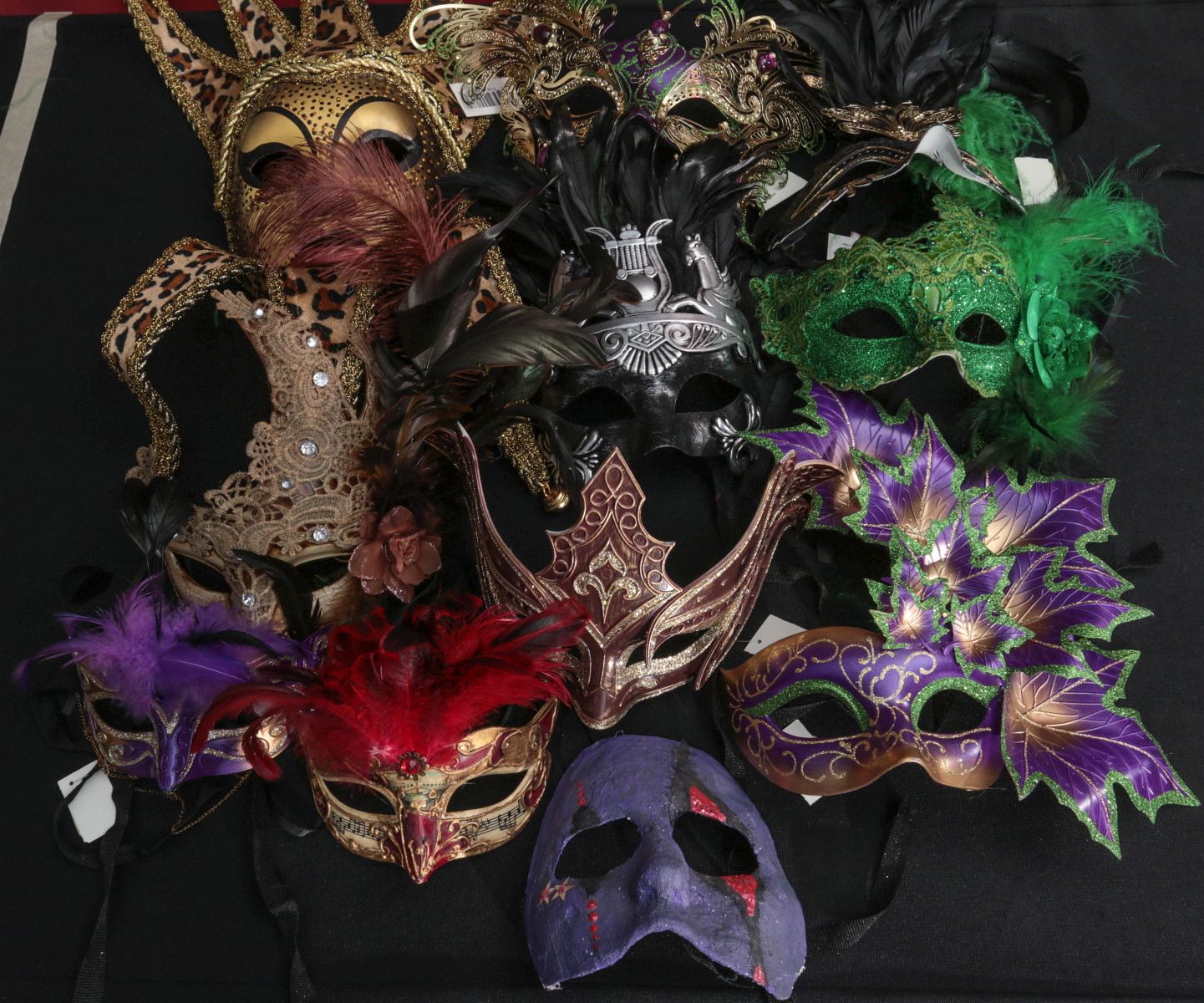 A COLLECTION OF MASQUERADE MASKS