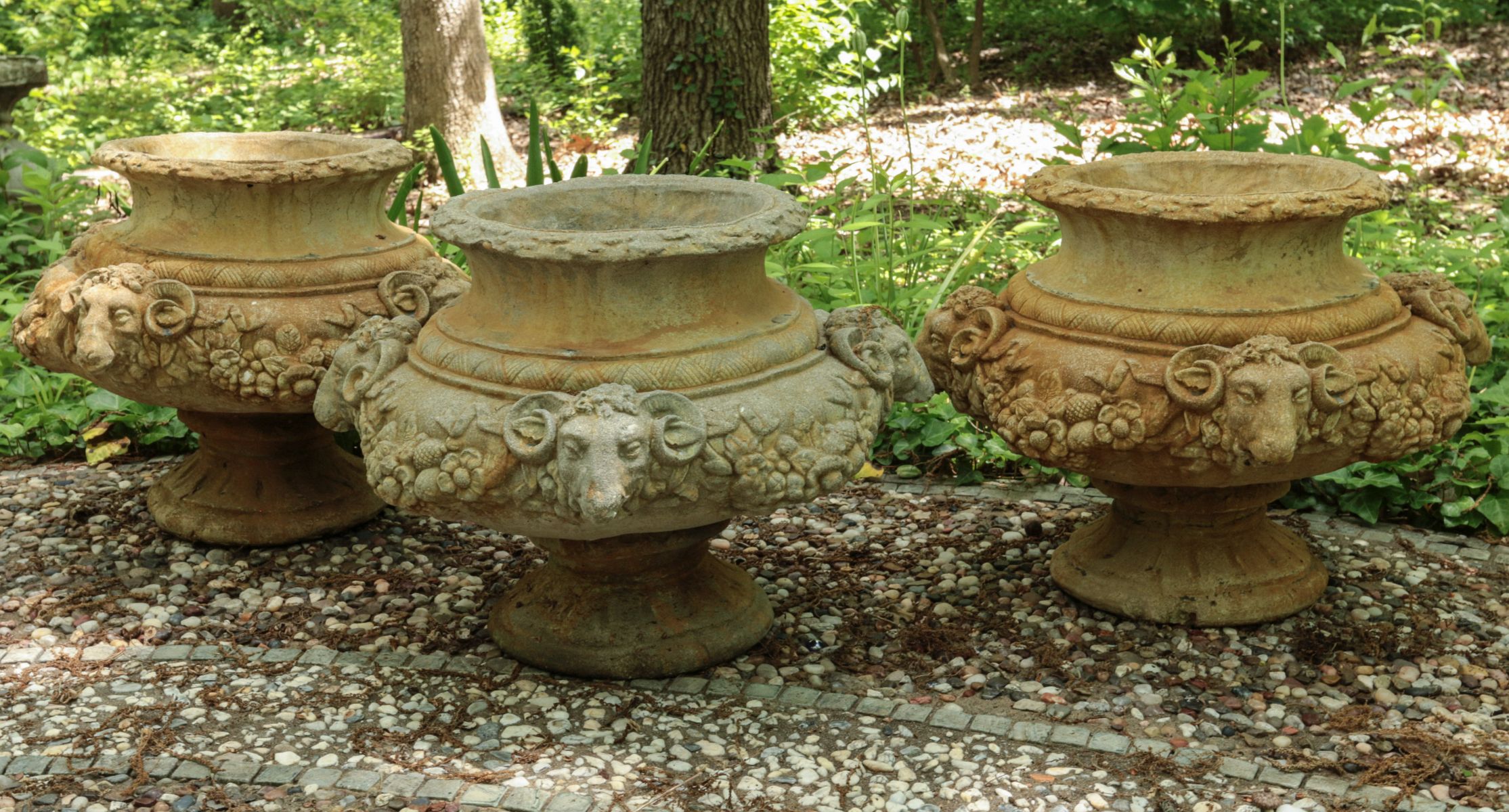 THREE RAM'S HEAD AND FESTOON CONCRETE PLANTERS