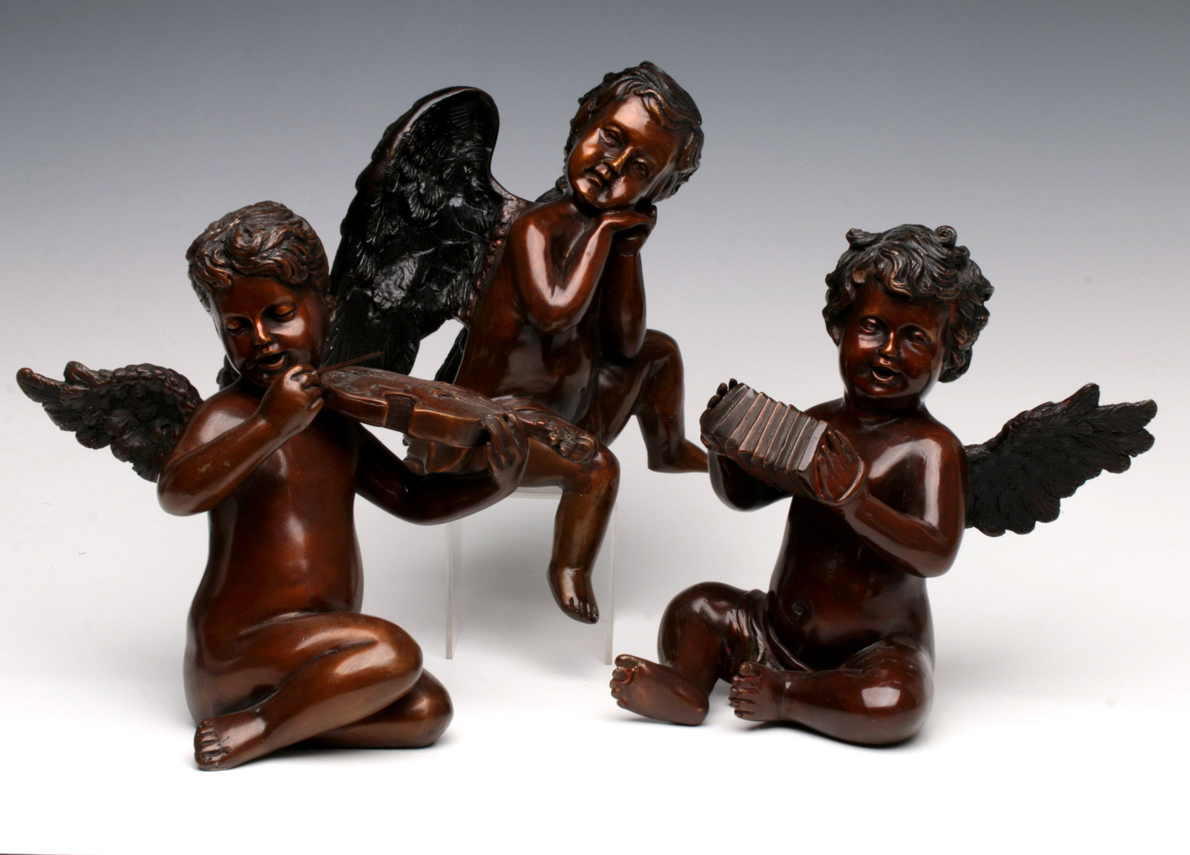 THREE LATE 20TH CENTURY BRONZE CHERUB FIGURES