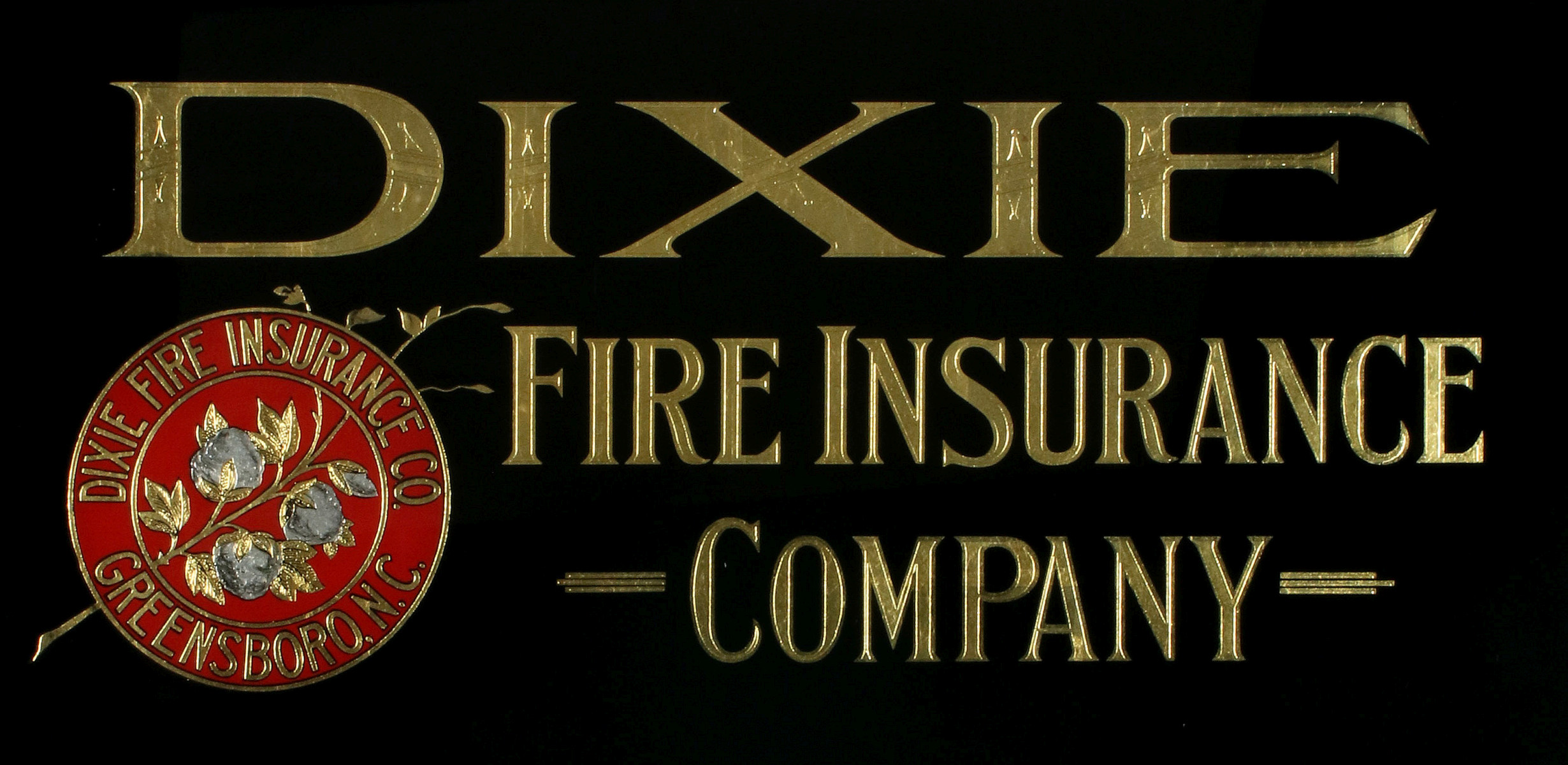 DIXIE FIRE INSURANCE REVERSE PAINTED SIGN CIRCA 1910