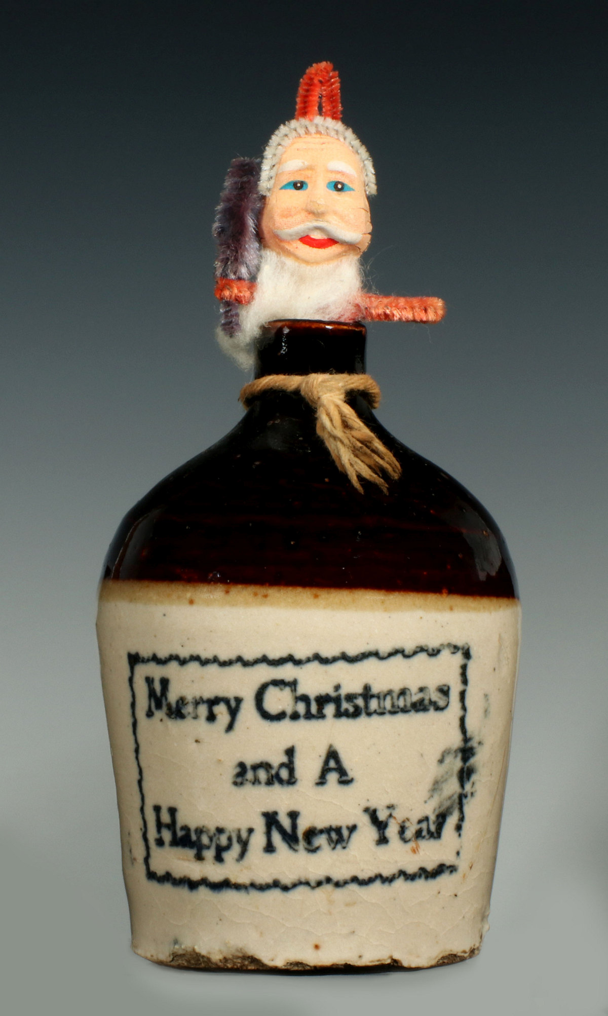 A CIRCA 1930 MERRY CHRISTMAS HAPPY NEW YEAR MINI JUG