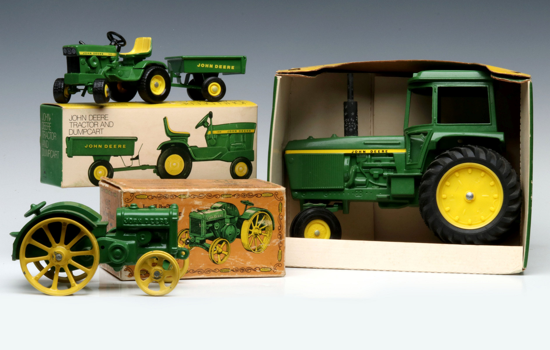 JOHN DEERE VINTAGE FARM TOYS IN THEIR ORIGINAL BOX