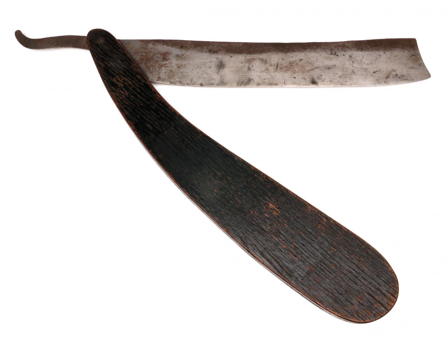 AN OVERSIZED 19TH CENTURY FOLK ART STRAIGHT RAZOR