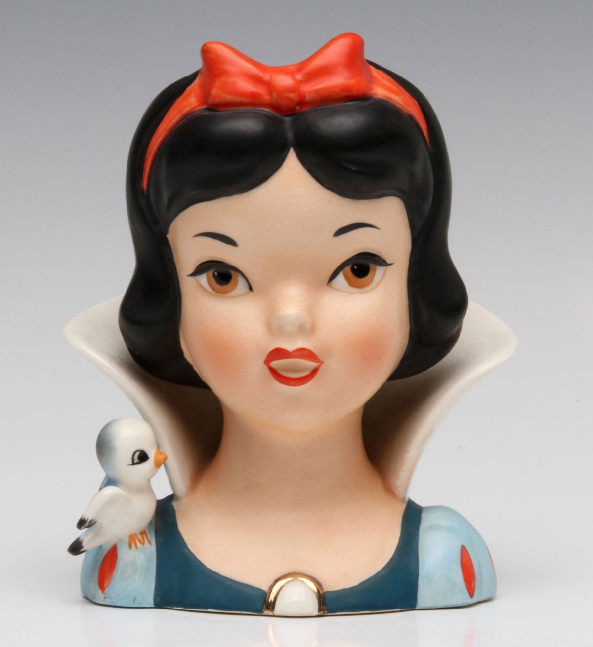 A RARE SNOW WHITE CERAMIC HEAD VASE BY ENESCO, C. 1960