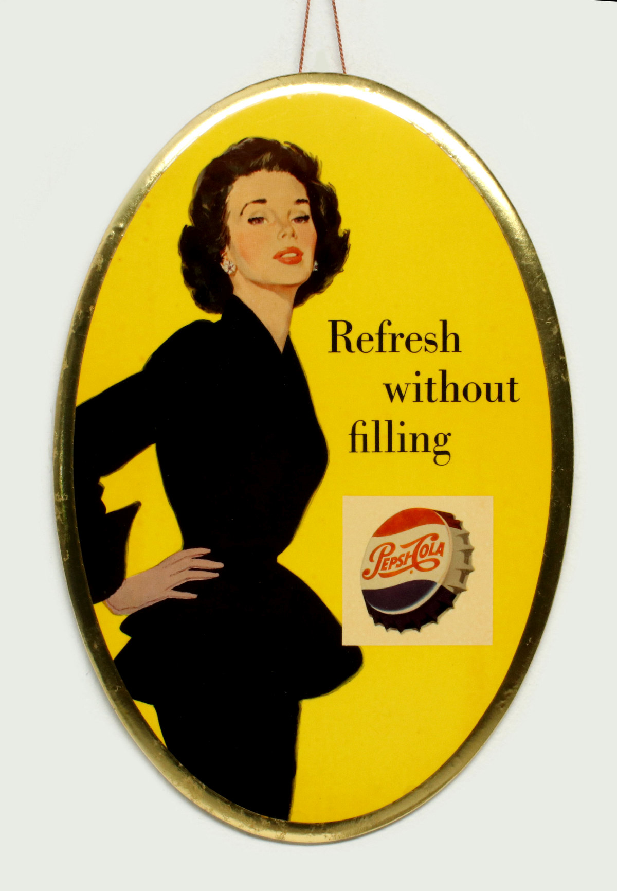 A SCARCE PEPSI COLA CELLULOID OVAL SIGN