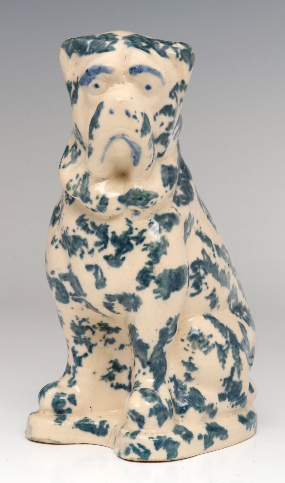 A BLUE SPONGE STONEWARE DOG ATTRIBUTED CROOKSVILLE OH