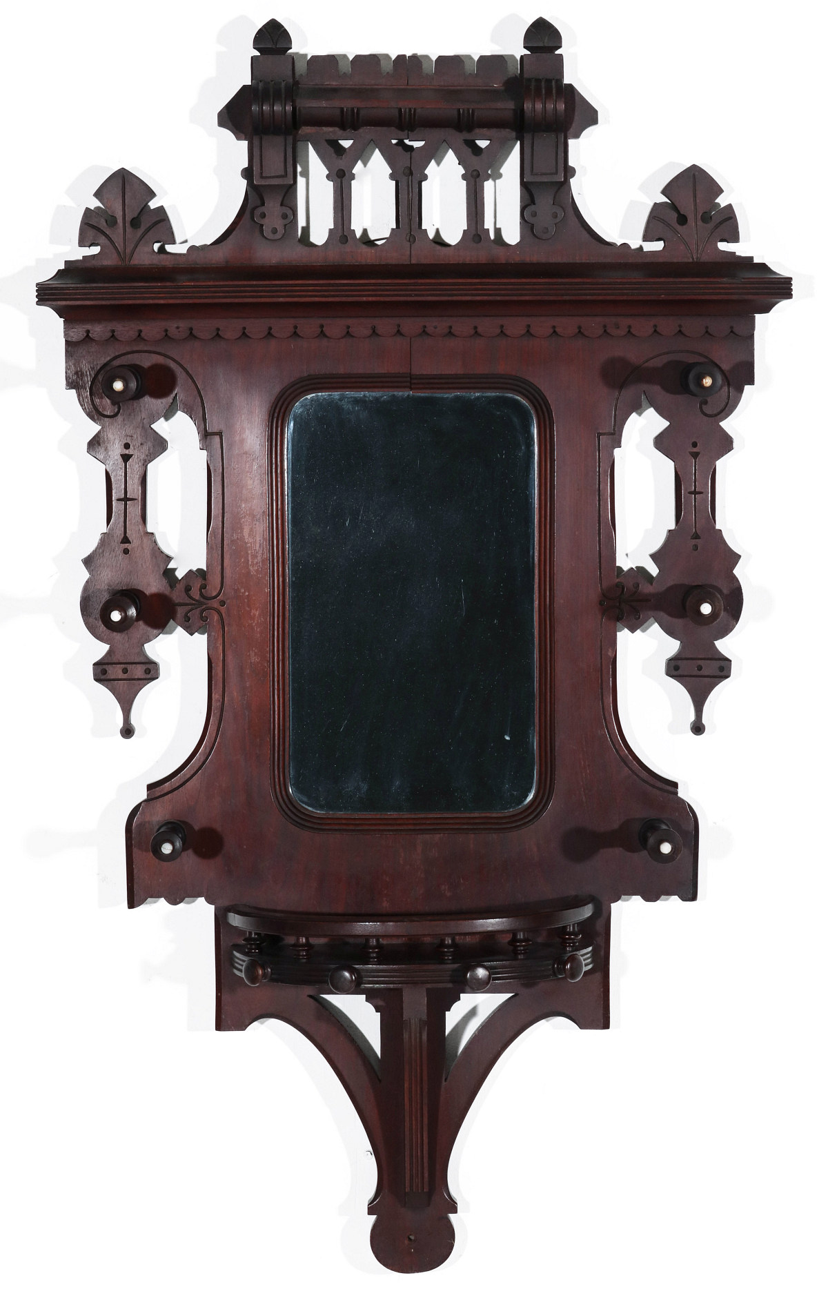 A VICTORIAN WALNUT EASTLAKE STYLE MIRRORED HAT RACK