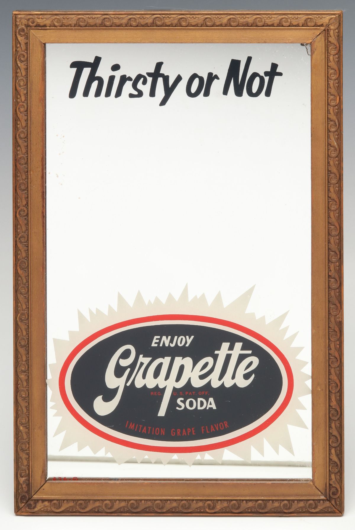 A CIRCA 1940 GRAPETTE ADVERTISING MIRROR