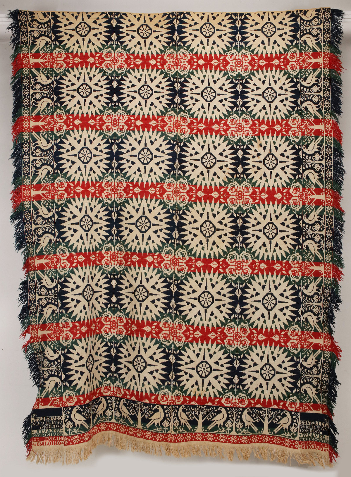 A FOUR COLOR COVINGTON OHIO WOVEN COVERLET DATED 1853