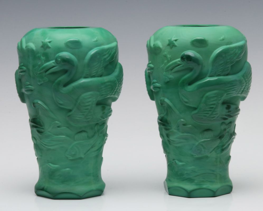 AN UNUSUAL MOLDED, POLISHED MALACHITE GLASS VASE PAIR