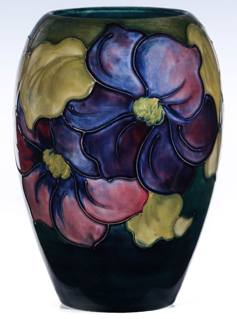 A MOORCROFT CLEMATIS PATTERN BRITISH ART POTTERY VASE