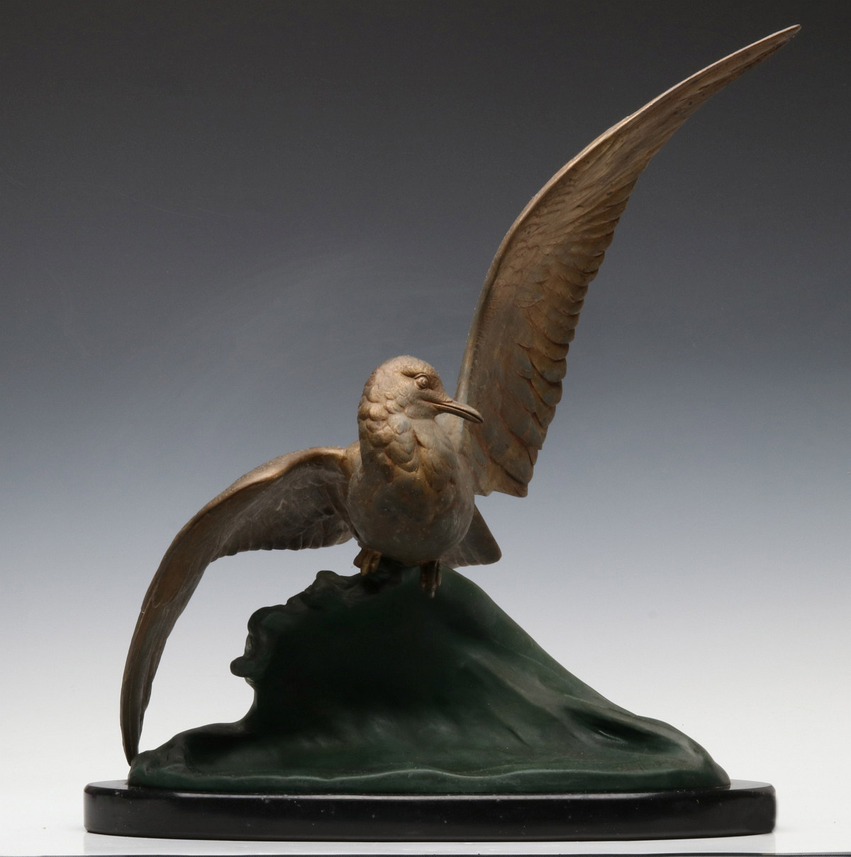 AN ART DECO SPELTER SCULPTURE OF GULL SIGNED J. LORIOT