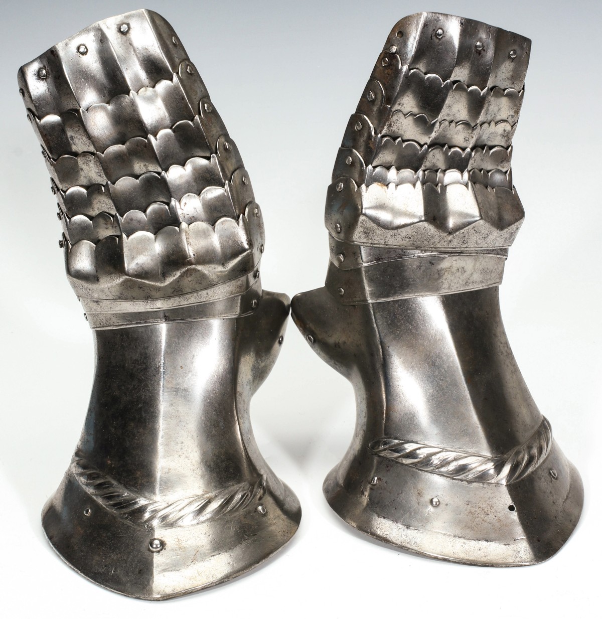 A PAIR CIRCA 15TH CENTURY ARMOR GAUNTLETS