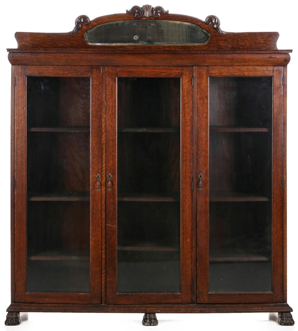 AN OAK TRIPLE BOOKCASE CIRCA 1900