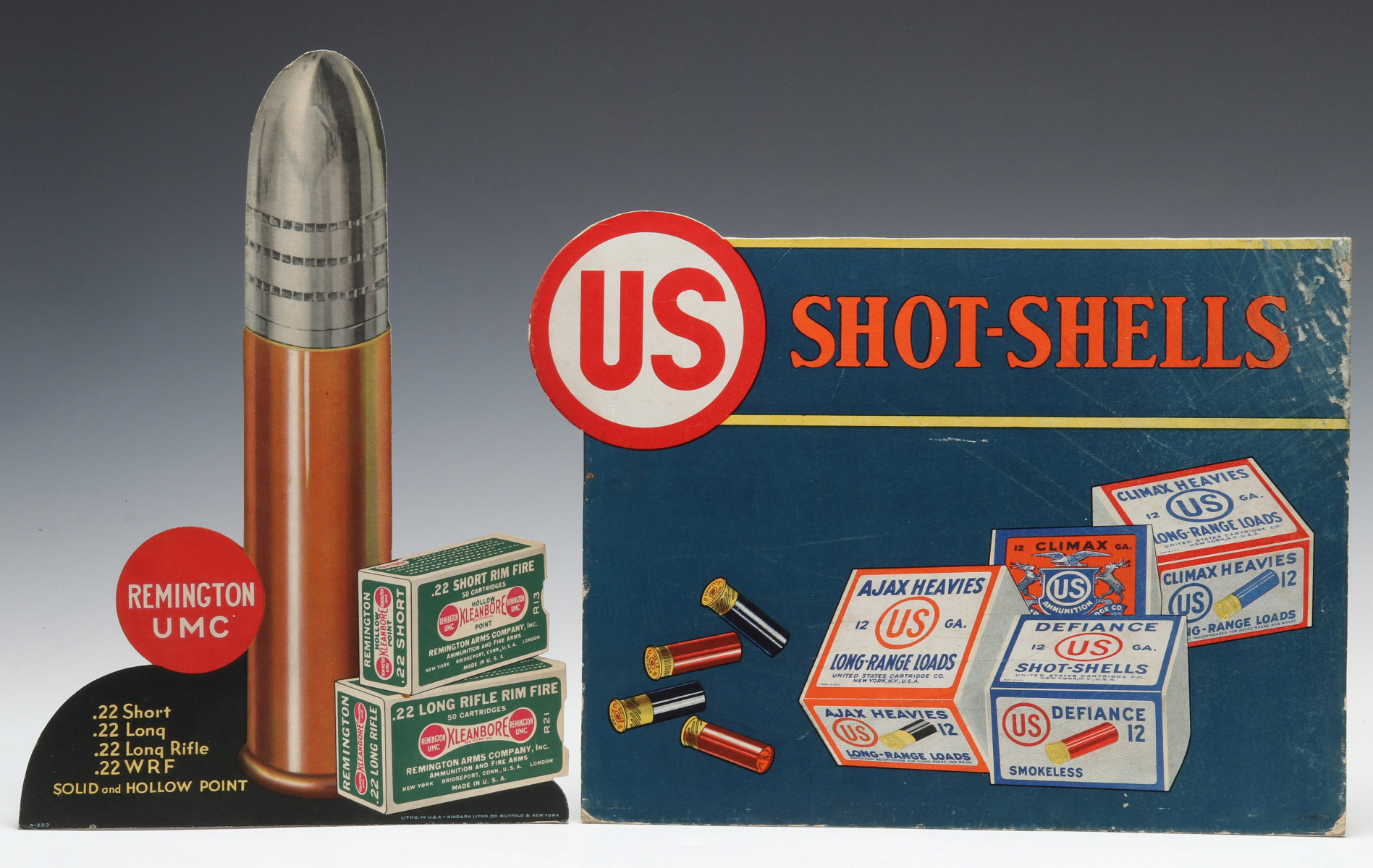 TWO MID 20TH CENTURY SHOT SHELL DIE-CUT STANDEE SIGNS