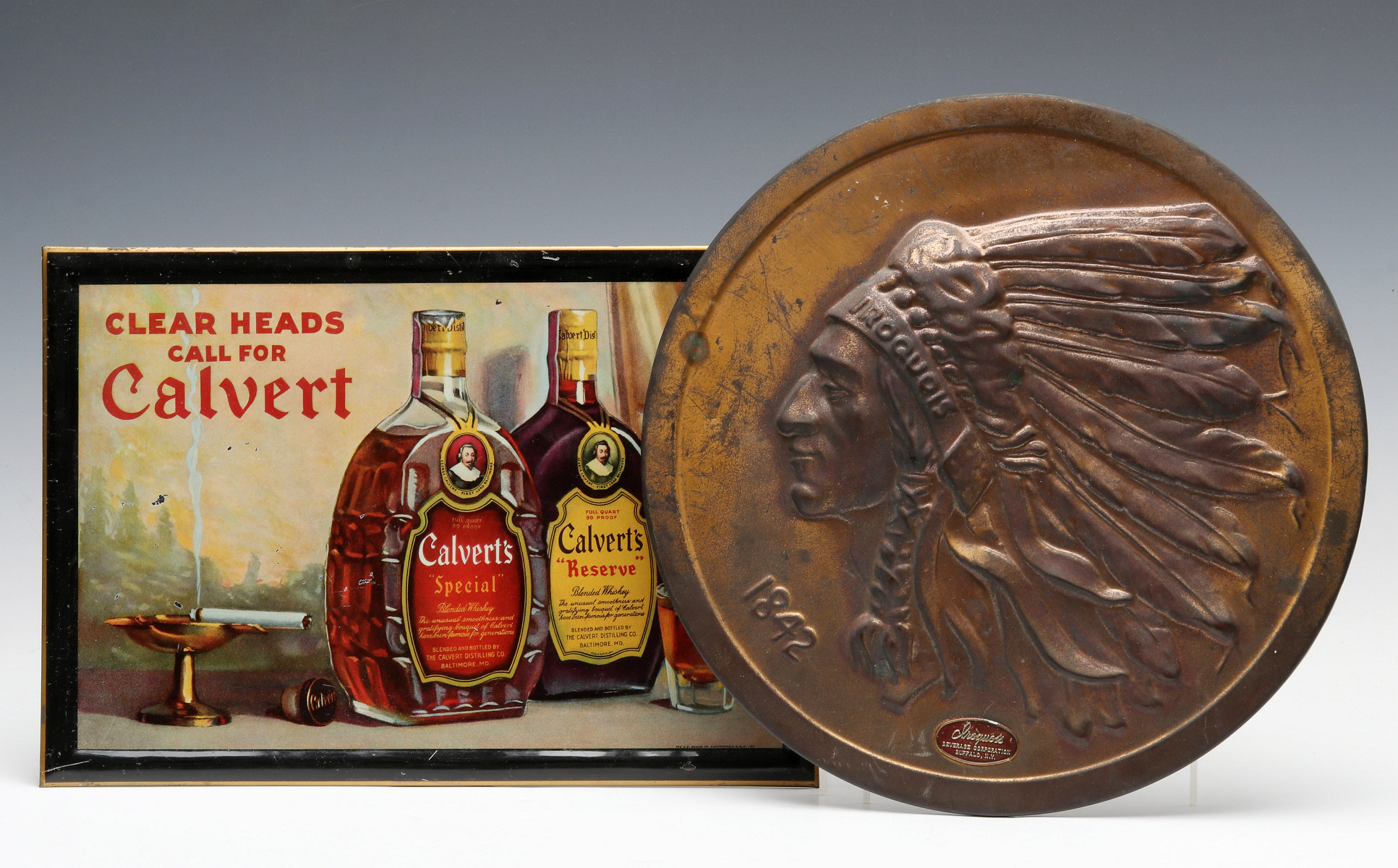 ADVERTISING SIGNS FOR CALVERT WHISKEY AND IROQUOIS BEER
