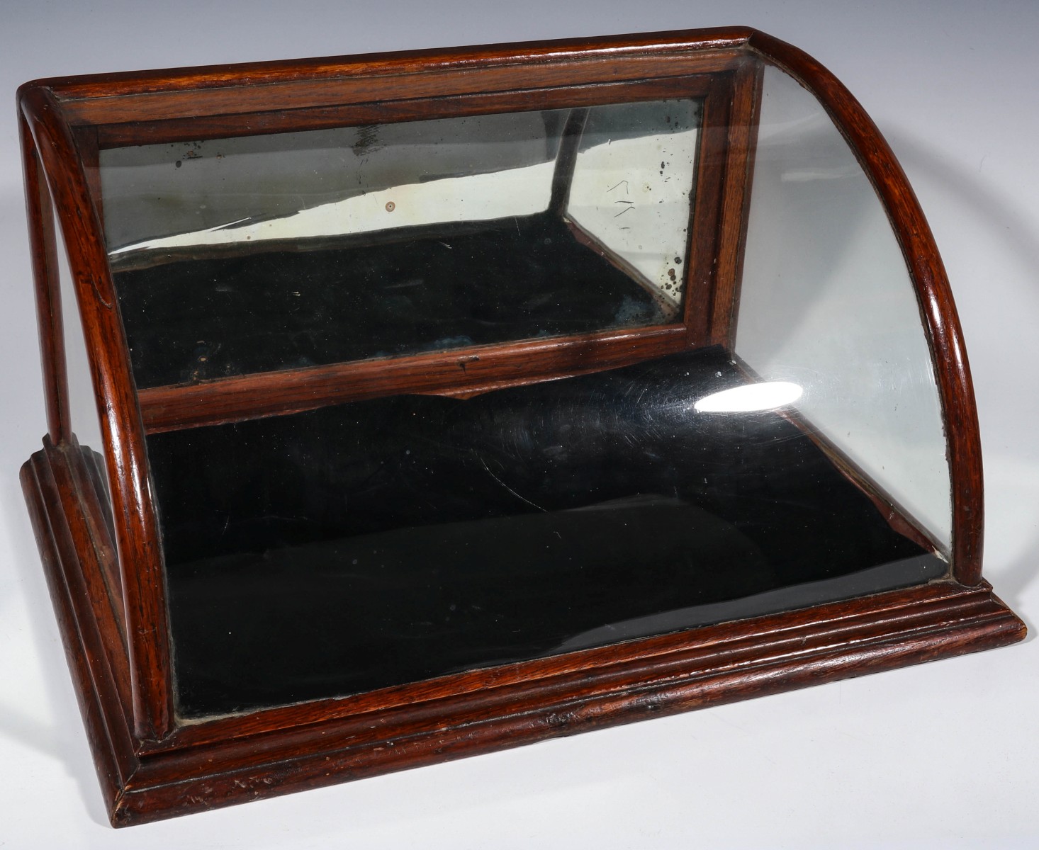 A GOOD SMALL ROUNDED FRONT COUNTER-TOP SHOWCASE C. 1910