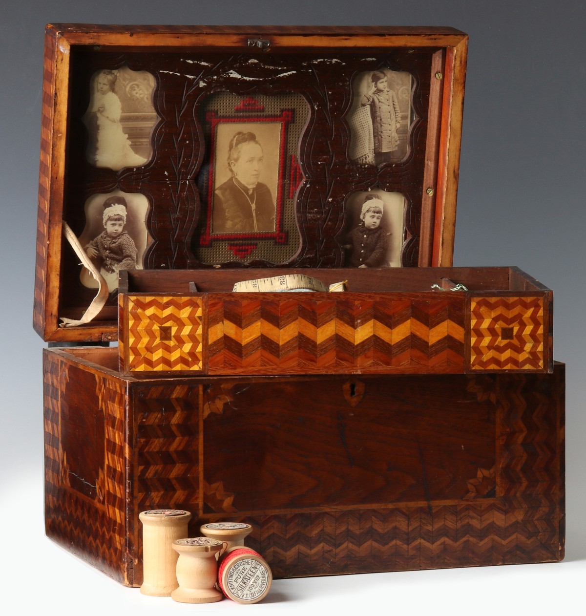 AN ELABORATE AMERICAN FOLK ART MARQUETRY SEWING BOX