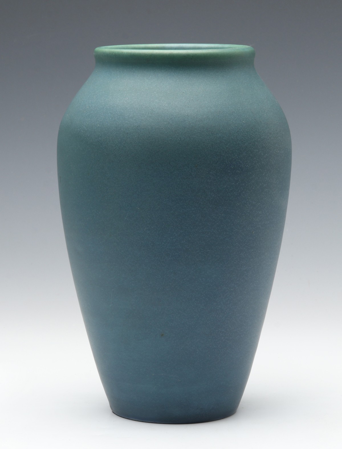 AN 8-INCH DEAD MATTE ROOKWOOD VASE DATED 1909