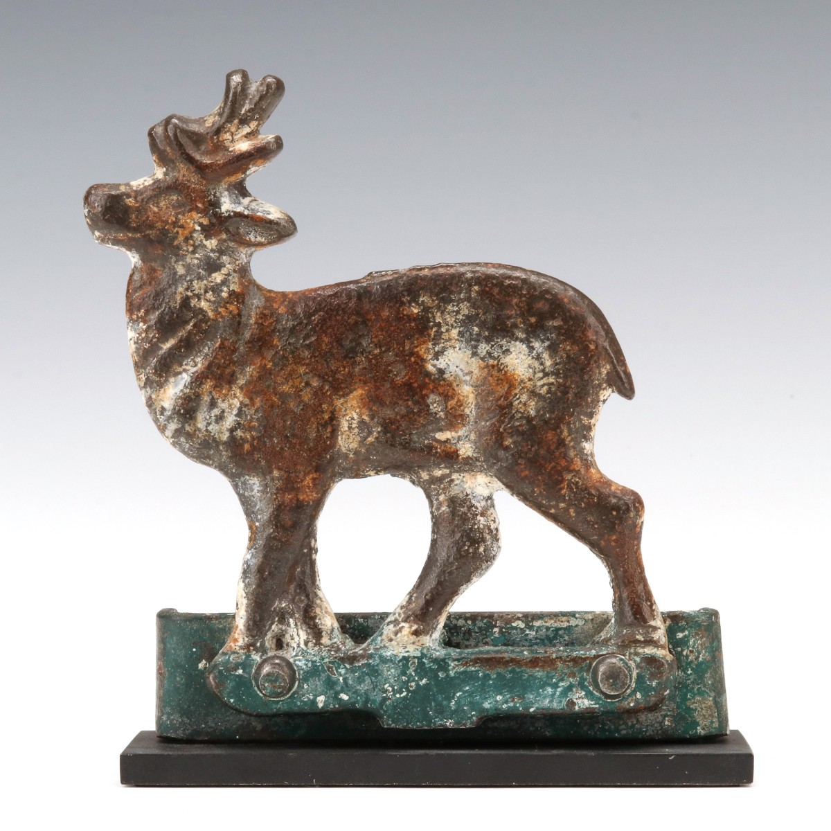 A FIGURAL CAST IRON DEER SHOOTING GALLERY TARGET