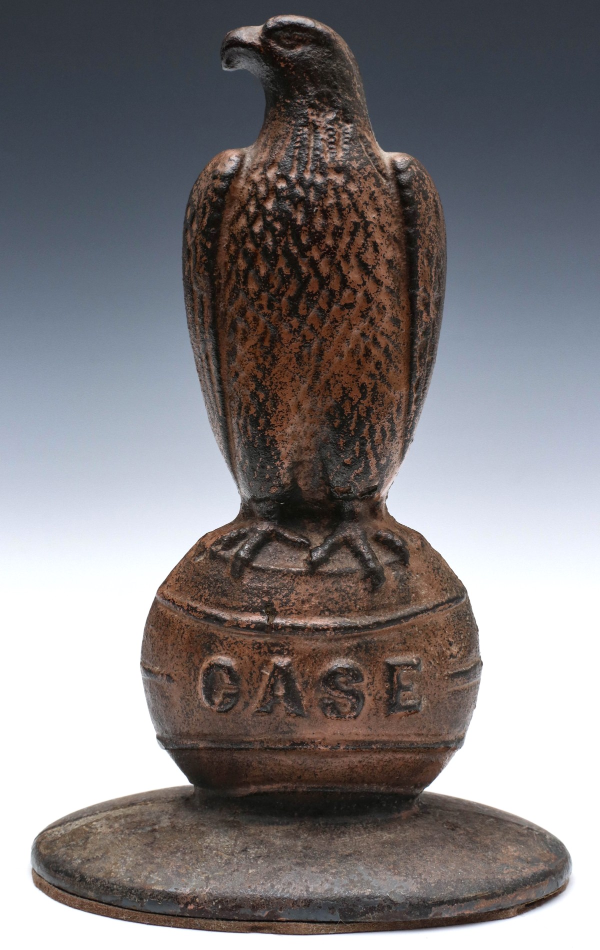 A DESKTOP CAST IRON CASE EAGLE ADVERTISING FIGURE