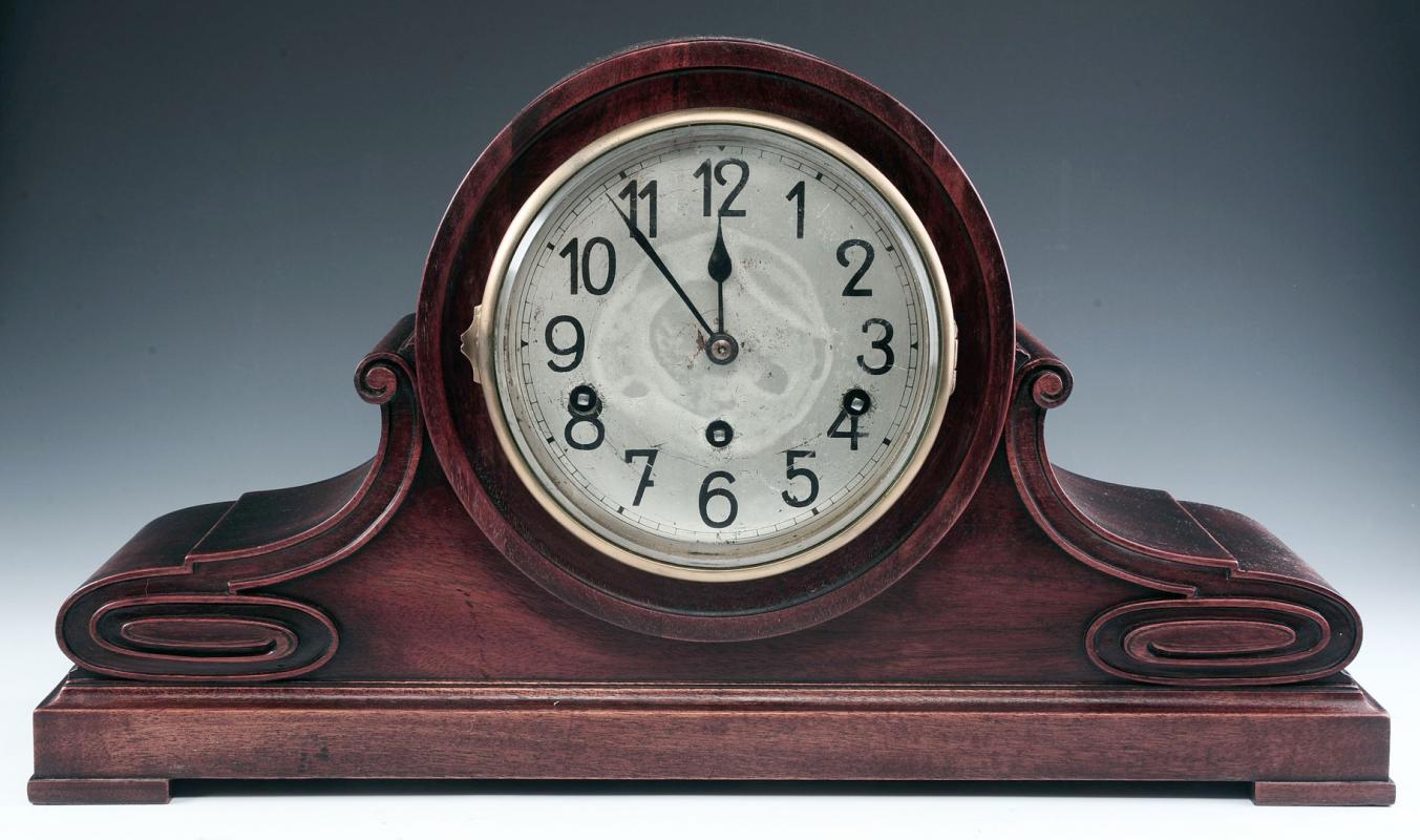 A QUARTER HOUR STRIKING MAHOGANY TAMBOUR CLOCK