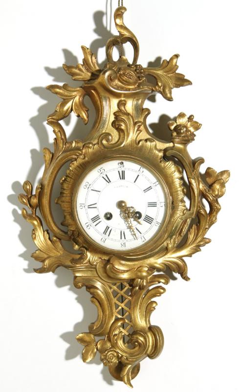 A 19TH C. GILDED BRONZE ROCOCO STYLE CARTEL CLOCK