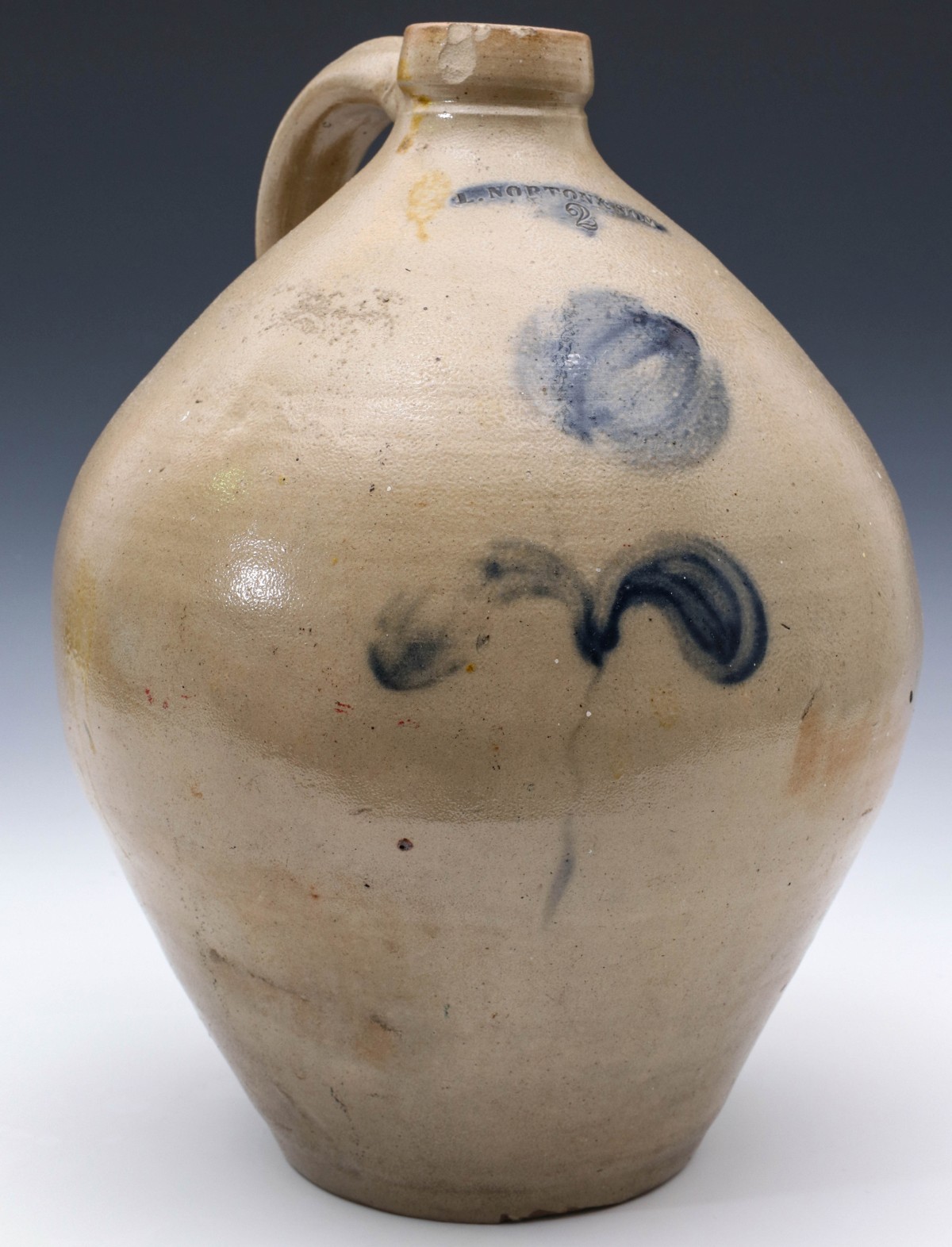 A BLUE DECORATED OVOID SALT GLAZED STONEWARE JUG