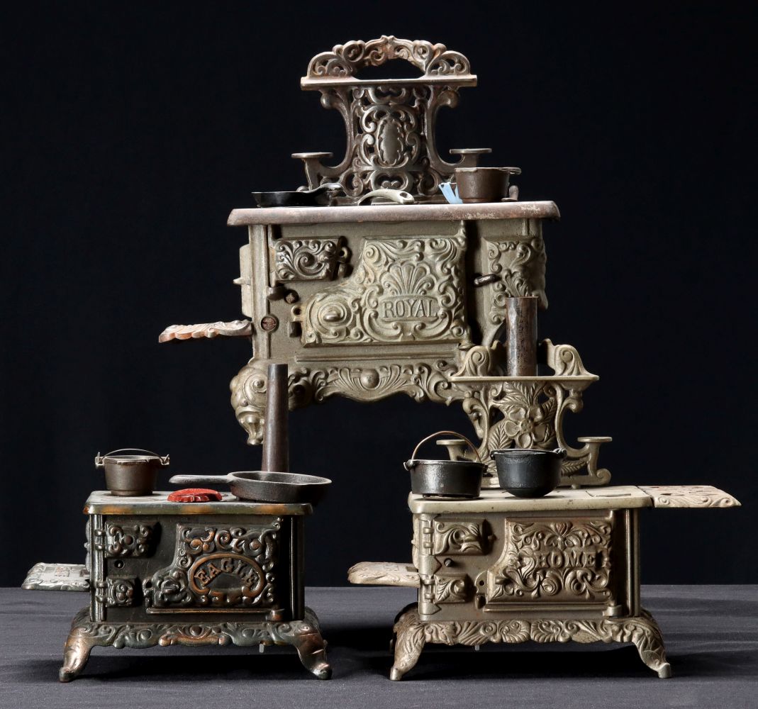 ROYAL, EAGLE AND HOME BRAND FANCY CAST IRON TOY STOVES