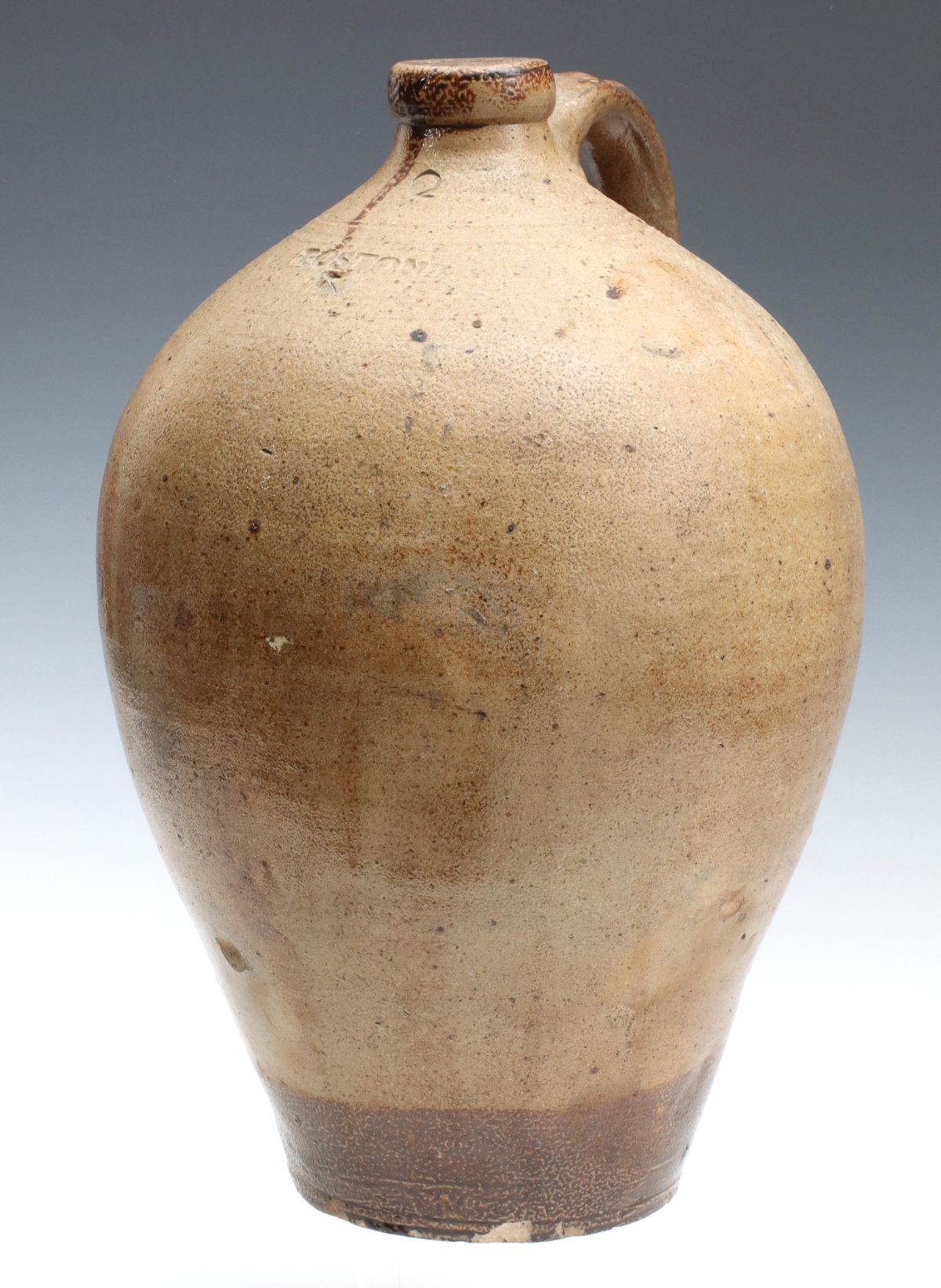 A 19TH CENTURY OVOID STONEWARE JUG STAMPED BOSTON