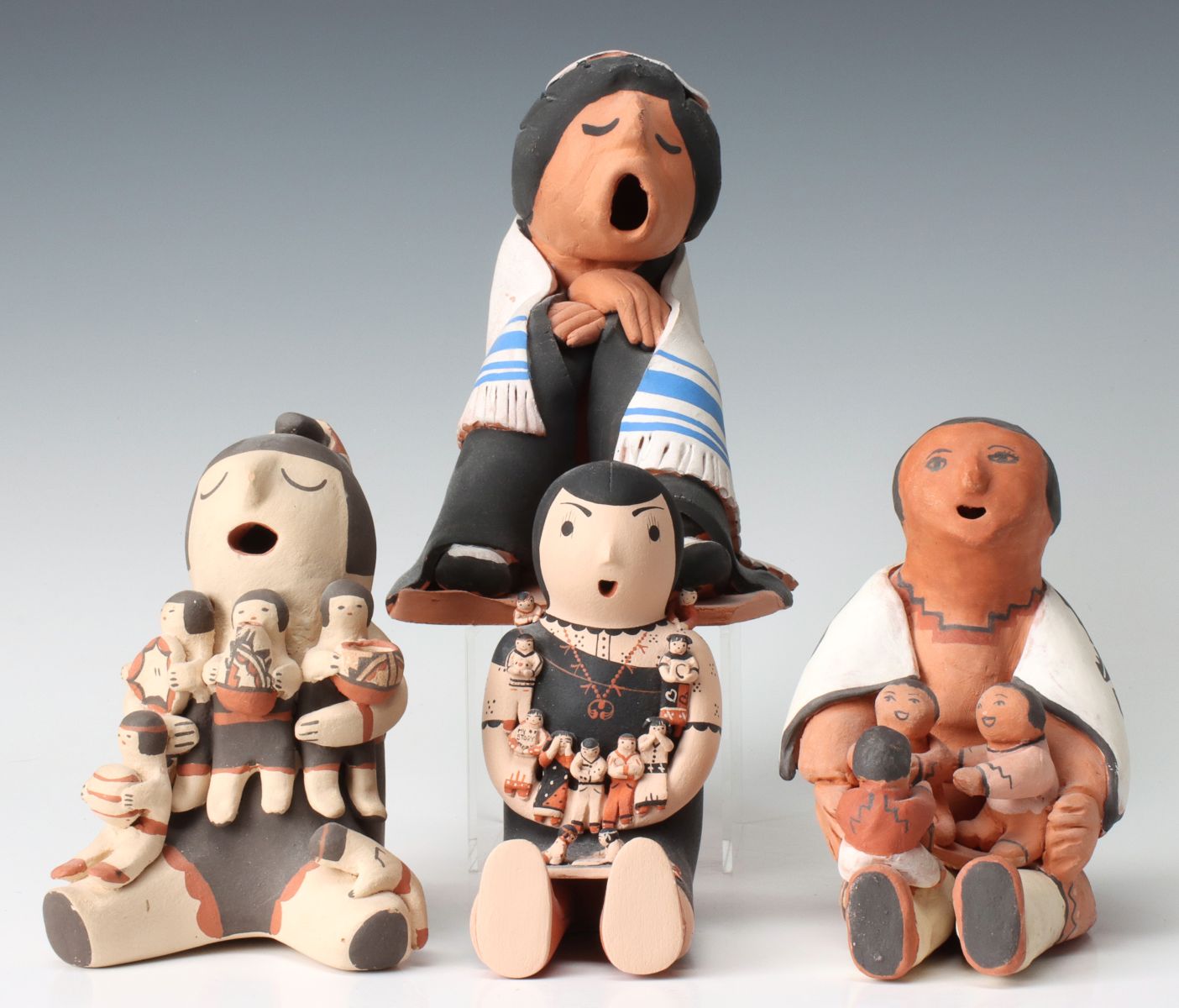 A COLLECTION OF PUEBLO POTTERY STORYTELLERS