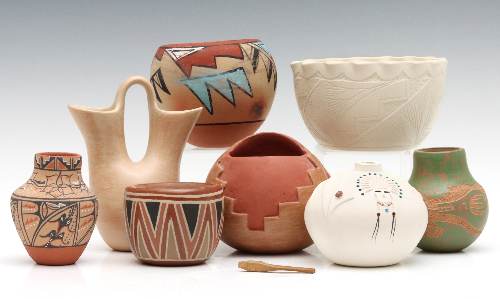 A COLLECTION OF ARTIST SIGNED JEMEZ PUEBLO POTTERY