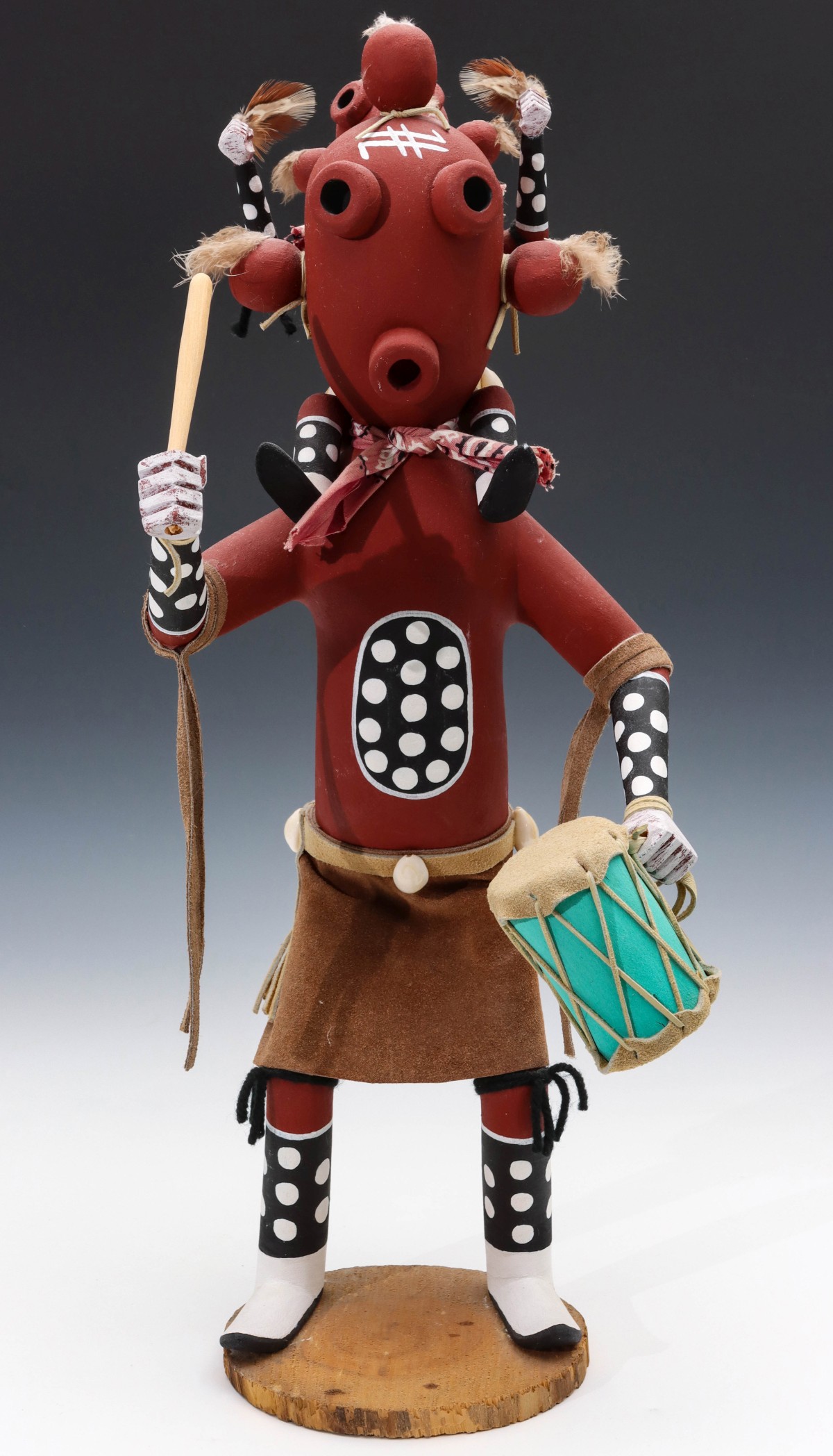 A LARGE NAVAJO MUDHEAD KACHINA BY JAMES BENALLY