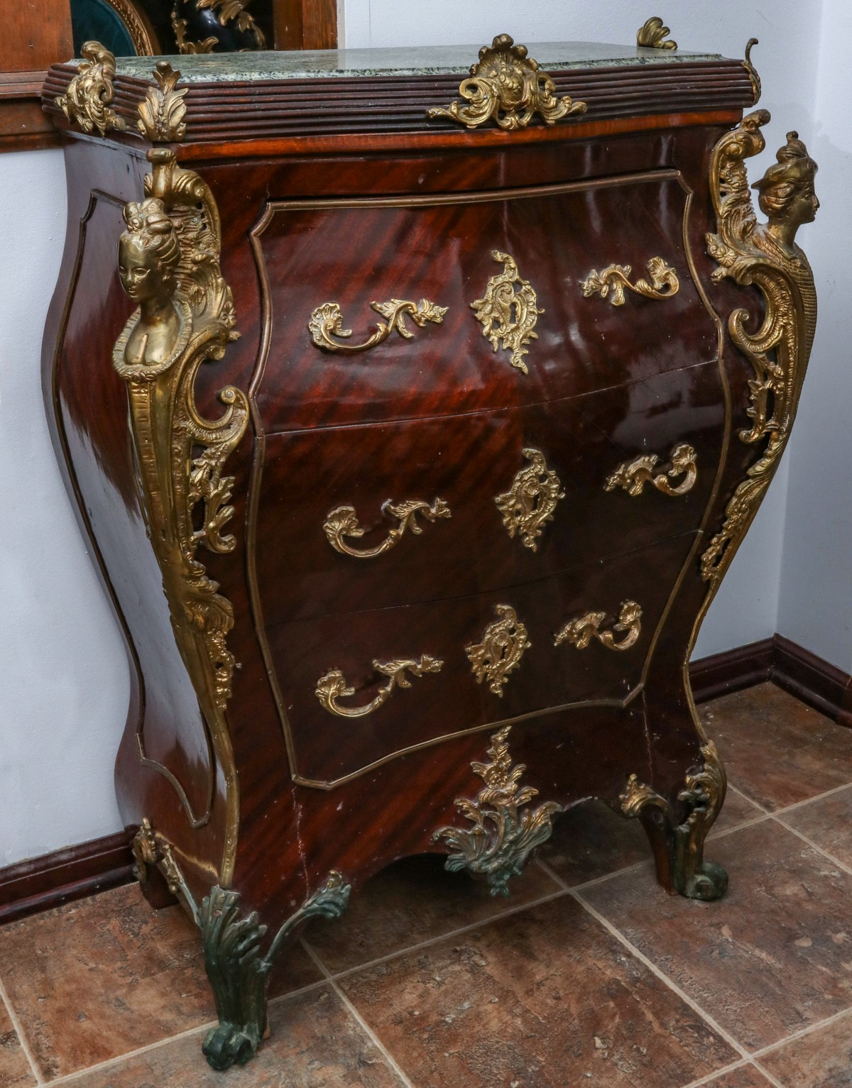 A LATE 20TH CENTURY BOMBÃ‰ CHEST WITH CAST BRASS LADIES