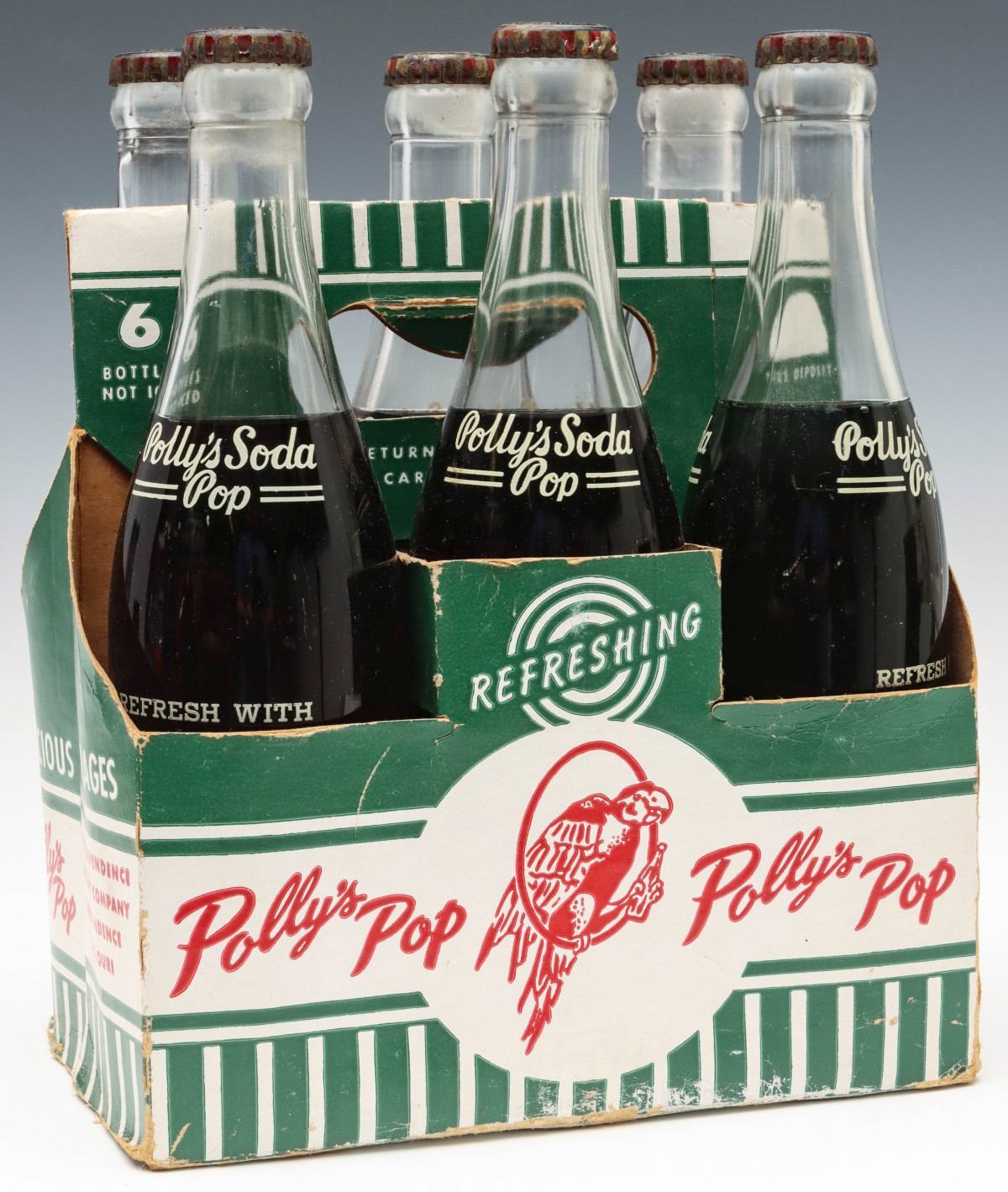 FULL SIX BOTTLE CARRIER OF ORIGINAL POLLY'S GRAPE SODA