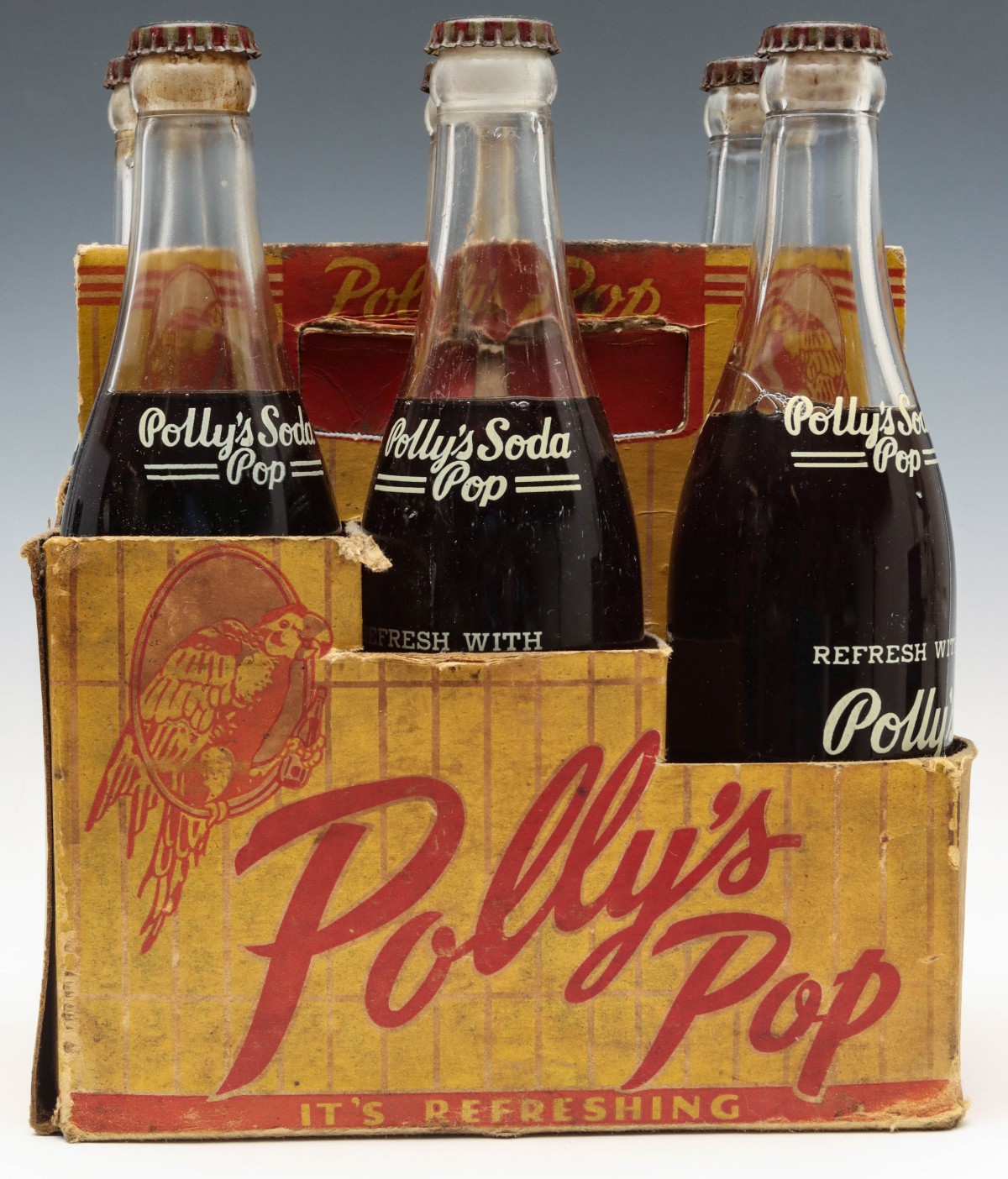 FULL SIX BOTTLE CARRIER OF ORIGINAL POLLY'S GRAPE SODA