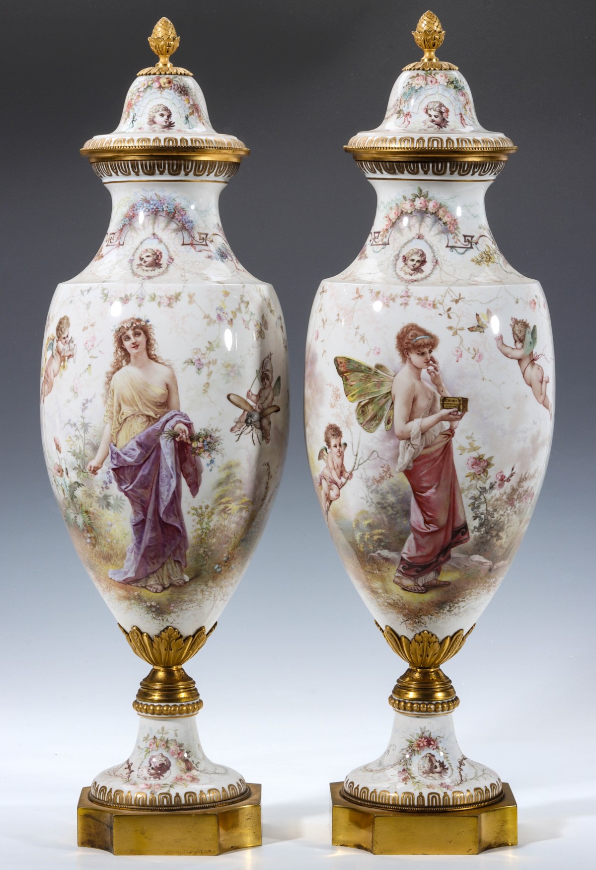 AN EXCEPTIONAL SEVRES URN PAIR SIGNED M. DEMONCEAUX